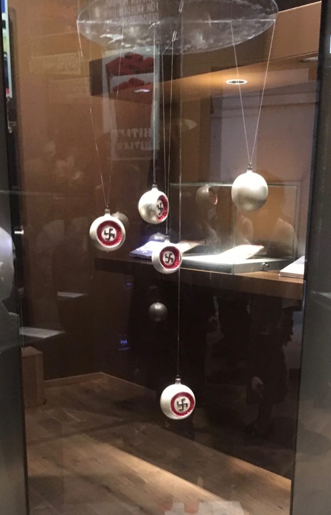 A cabinet showing Nazi Christmas baubles