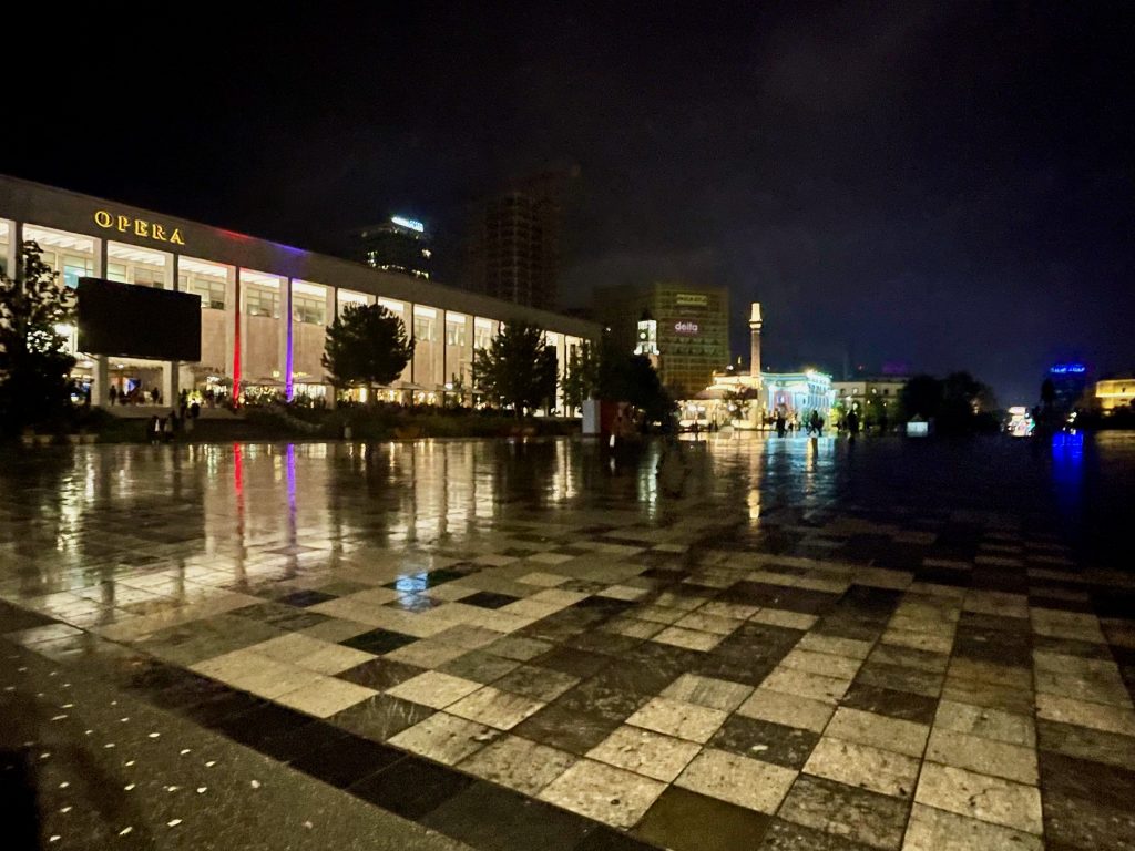 Nightime photograph of Skanderbeg Square showing the easily navigable paved surface